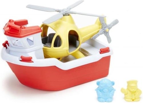 Grünes Spielzeug-Rettungsboot mit Hubschrauber